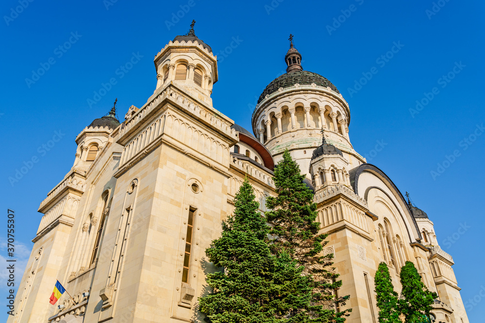 The orthodox cathedral in Cluj Napoca, Transylvania, Romania. Cathedral of the Dormition of the Theotokos or Dormition of the Mother of God built in  Brancovenesc style on the Avram Iancu Square