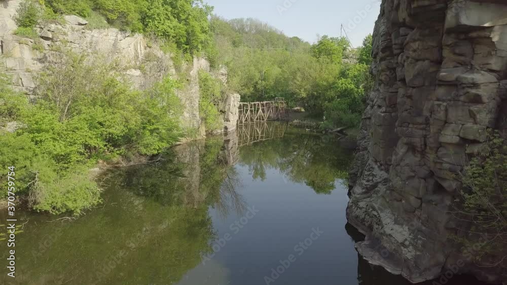 Aerial top view to Buky Canyon on river Hirskyi Tikich , Cherkassy region, Ukraine. Famous ukranian landscape and touristic places Aerial top view to Buky Canyon on river Hirskyi Tikich , Cherkassy region, Ukraine. Famous ukranian landscape and touristic places