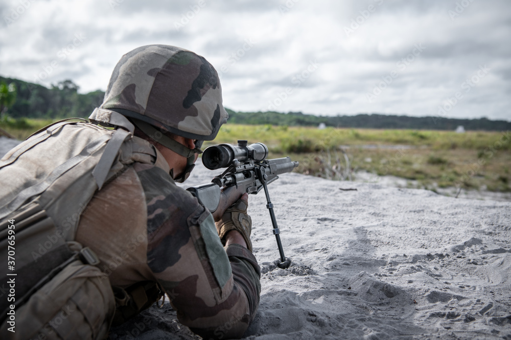 Foreign Legion sniper in position Foreign Legion sniper in position