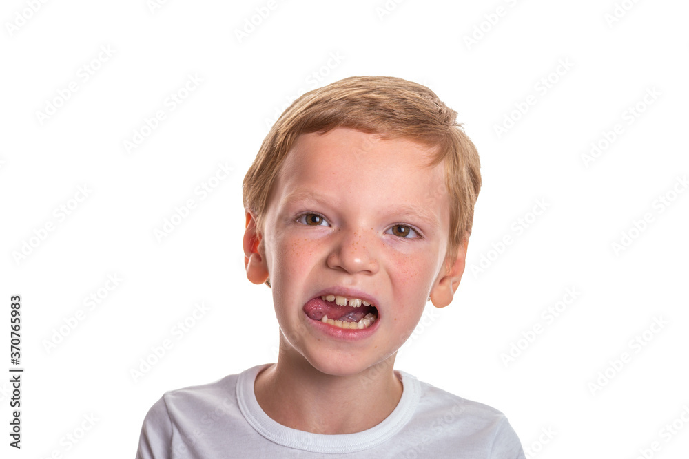 Speech therapy concept. Little boy doing exercises for correct pronunciation. Isolation on a white background. High quality photo Speech therapy concept. Little boy doing exercises for correct pronunciation. Isolation on a white background. High quality photo