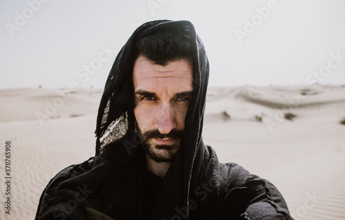 Man exploring the desert photo