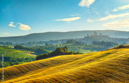 San Gimignano medieval town towers skyline and countryside. Tuscany, Italy