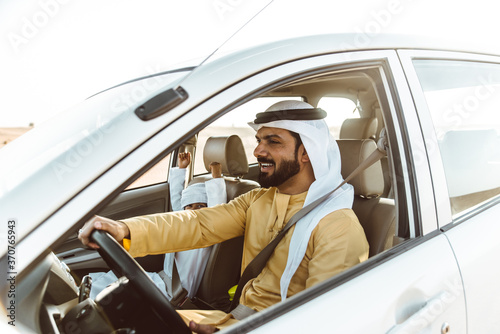 father and son spending time,driving in the desert