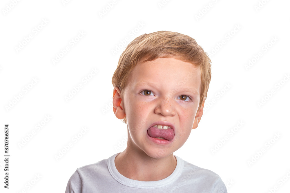 Speech therapy concept. Little boy doing exercises for correct pronunciation. Isolation on a white background. High quality photo Speech therapy concept. Little boy doing exercises for correct pronunciation. Isolation on a white background. High quality photo