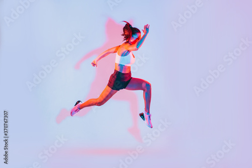 Beautiful fit woman making sport and running