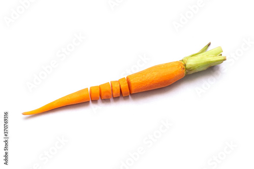 Fresh baby carrot orange vegetable isolated on white background. Fresh baby carrots are shred. selective focus, soft focus.
