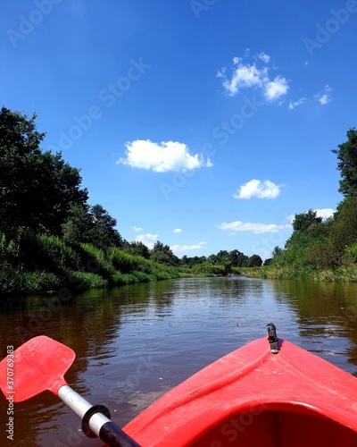 canoeing on the lake on a sunny summer day