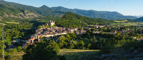 The village of Tallard and its medieval castle at sunset in the Durance Valley (panoramic). Hautes-Alpes (05), Alps, France