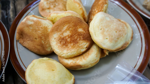 pukis snack. indonesian street food made from flour eggs yeast and coconut milk