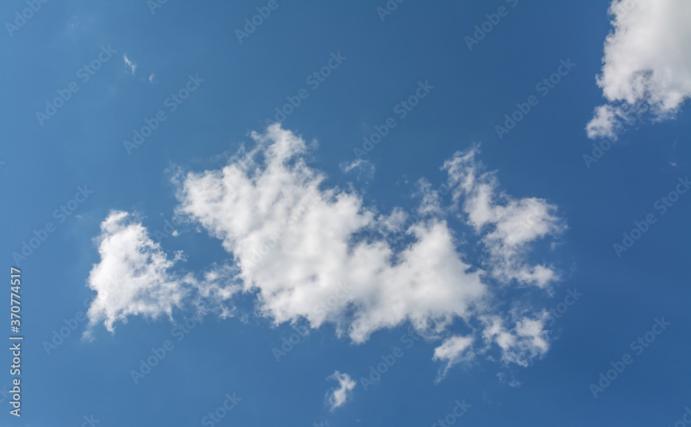 White clouds in the blue sky. White clouds in the blue sky.