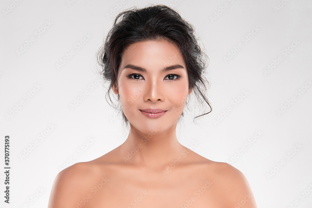 Beautiful Young asian Woman with Clean Fresh Skin, on white background, Face care, Facial treatment, Cosmetology, beauty and spa, Asian women portrait Beautiful Young asian Woman with Clean Fresh Skin, on white background, Face care, Facial treatment, Cosmetology, beauty and spa, Asian women portrait