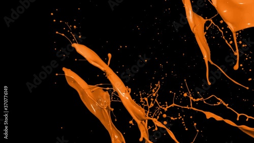 Orange paint splash thrown in slow motion, liquid isolated on black (4K)