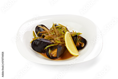 Cooked mussels in shells isolated on white
