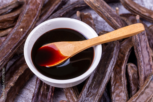 Carob molasses and carob po...