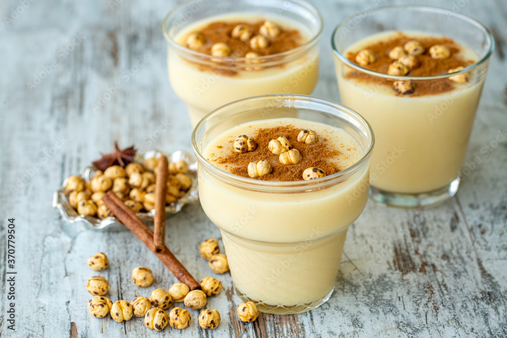 Boza or Bosa, traditional Turkish drink with roasted chickpea Boza or Bosa, traditional Turkish drink with roasted chickpea
