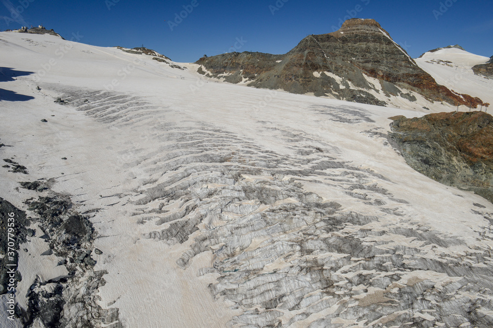 Theodul glacier at small Matterhorn over Zermatt in the Swiss alps