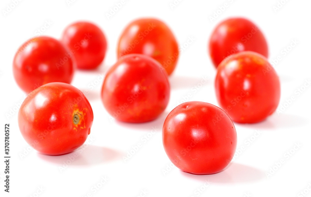 Red natural tomatoes isolated on white background. Red natural tomatoes isolated on white background.