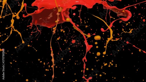 Splash of red and orange paint liquid in slow motion isolated on black (4K)