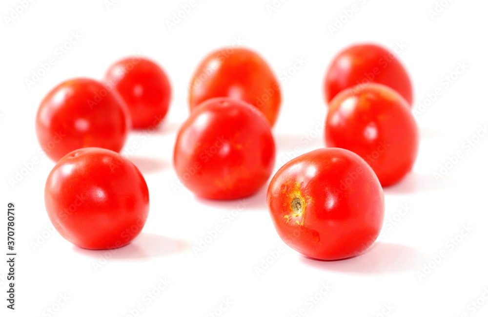 Red natural tomatoes isolated on white background. Red natural tomatoes isolated on white background.