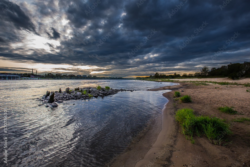 Amazing sunrise over the river. Bridge on the Vistula river in Wloclawek city, Poland