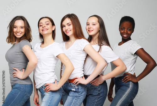 five multiracial, african american, european and asian girls
