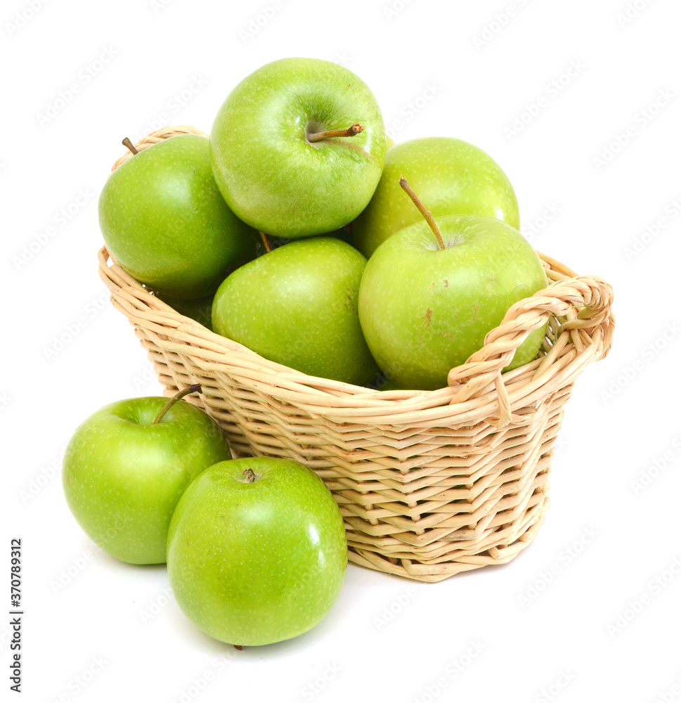 Green apples in basket on a white background Green apples in basket on a white background