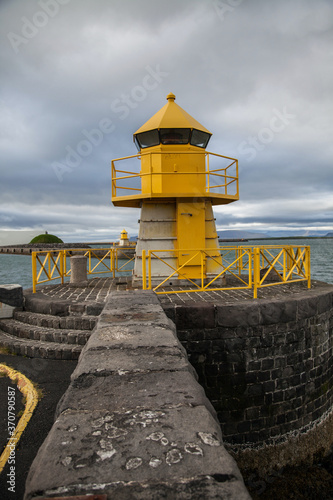 Lighthouses and Thúfa seen in Reykjavik, Iceland photo