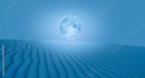 Night sky with full moon sand dune on the foreground  Elements of this image furnished by NASA