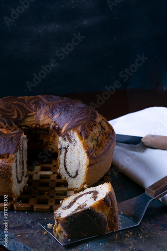 Delicious homemade marble pound cake on a stone board