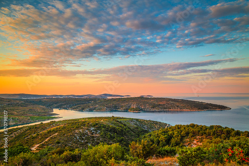 Panoramic view of Adriatic coast near The Primosten town at the colorful dawn of the day  Croatia  Europe.