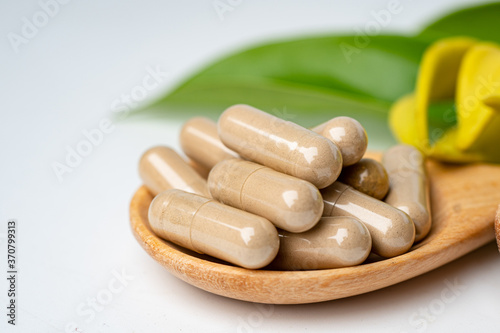 Alternative medicine herbal organic capsule, mineral, drug with herbs leaf natural supplements for healthy good life.