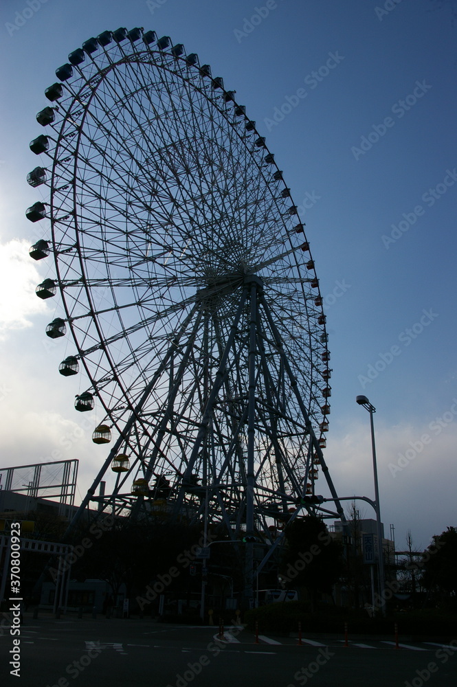  Silhouette  and background of Tempozan Ferris Wheel . The former  tallest Ferris wheel in the world about 17 min per round