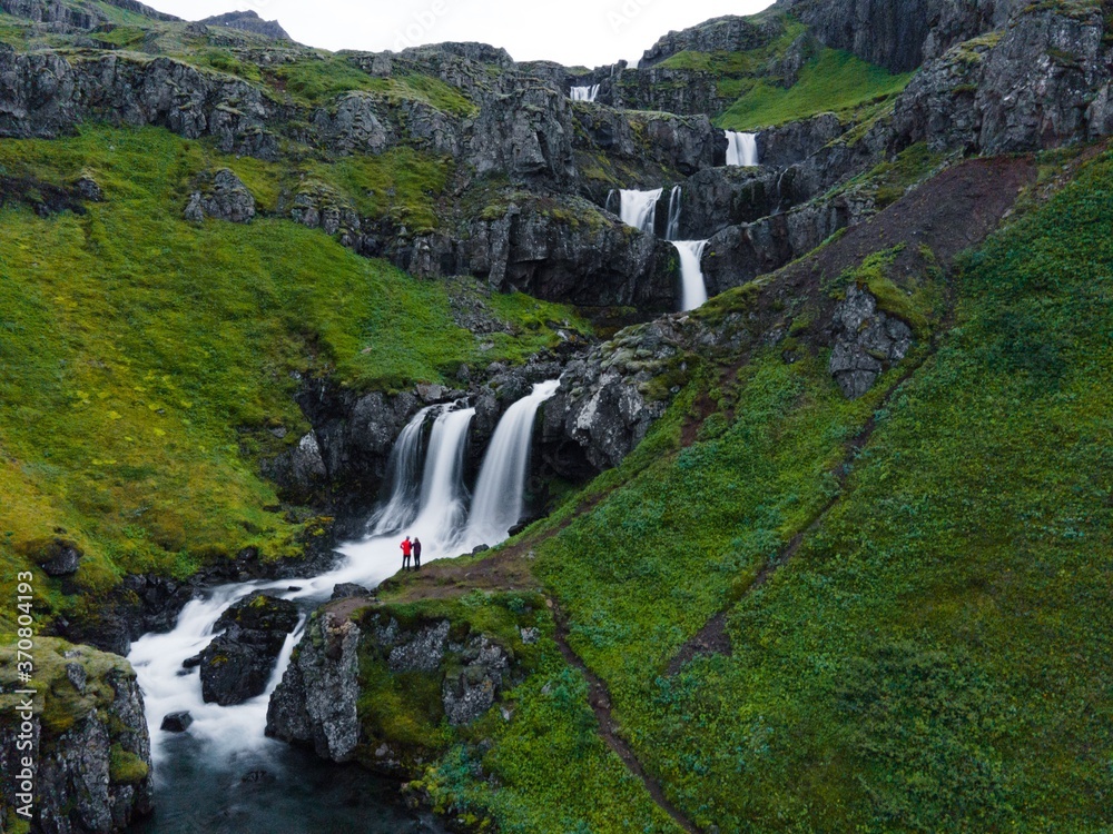Klifbrekkufossar Waterfalls on the Eastern Coast of Iceland - obrazy, fototapety, plakaty 