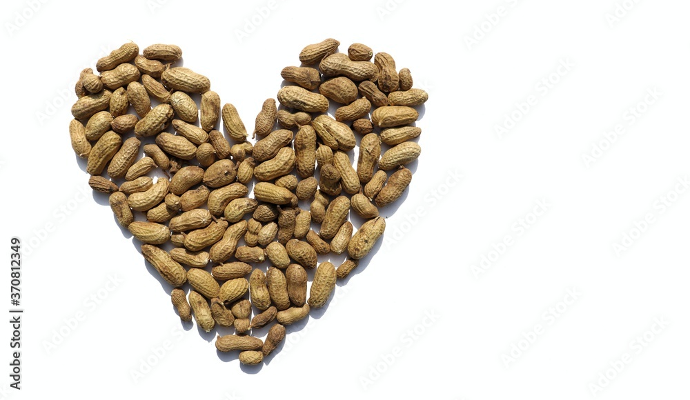 Heart Shape Created with Peanuts on White Background with Copy Space for Texts, Perfect for Wallpaper Heart Shape Created with Peanuts on White Background with Copy Space for Texts, Perfect for Wallpaper