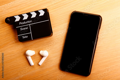 image of mobile phone clapper board headphone 