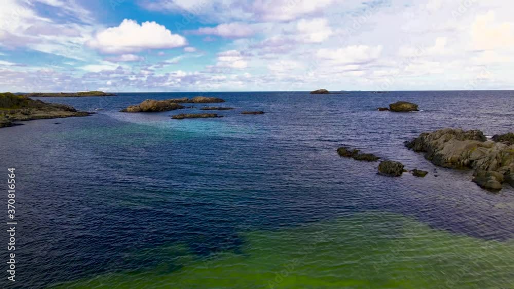 4K 60fps - Drone flying over sandy beach over crystal clear water on a beautiful sunny summer day. 4K 60fps - Drone flying over sandy beach over crystal clear water on a beautiful sunny summer day.