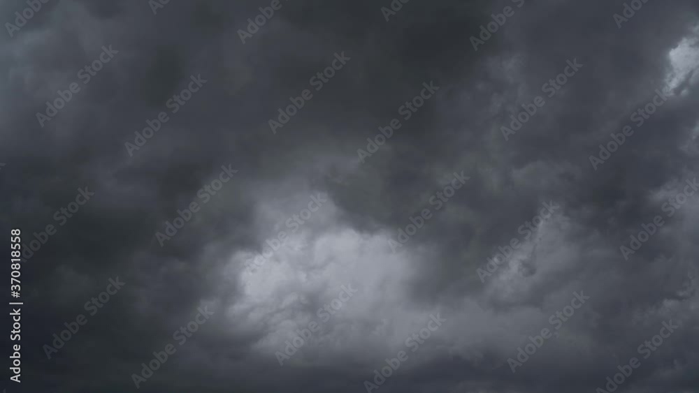 The dark blue sky and fine clouds are about to storm. Storm clouds in the sky. The dark blue sky and fine clouds are about to storm. Storm clouds in the sky.