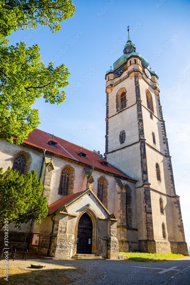 Steple of gothic church of St. Peter and Paul in town Melnik, Czech republic