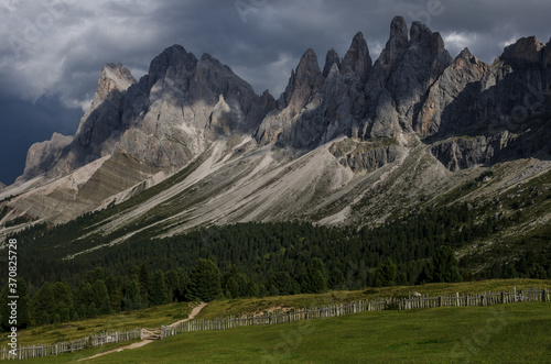 Odle mountain range before thunderstorm as seen from Brogles refuge, Puez-Odle nature park, Dolomites, South Tirol, Italy.