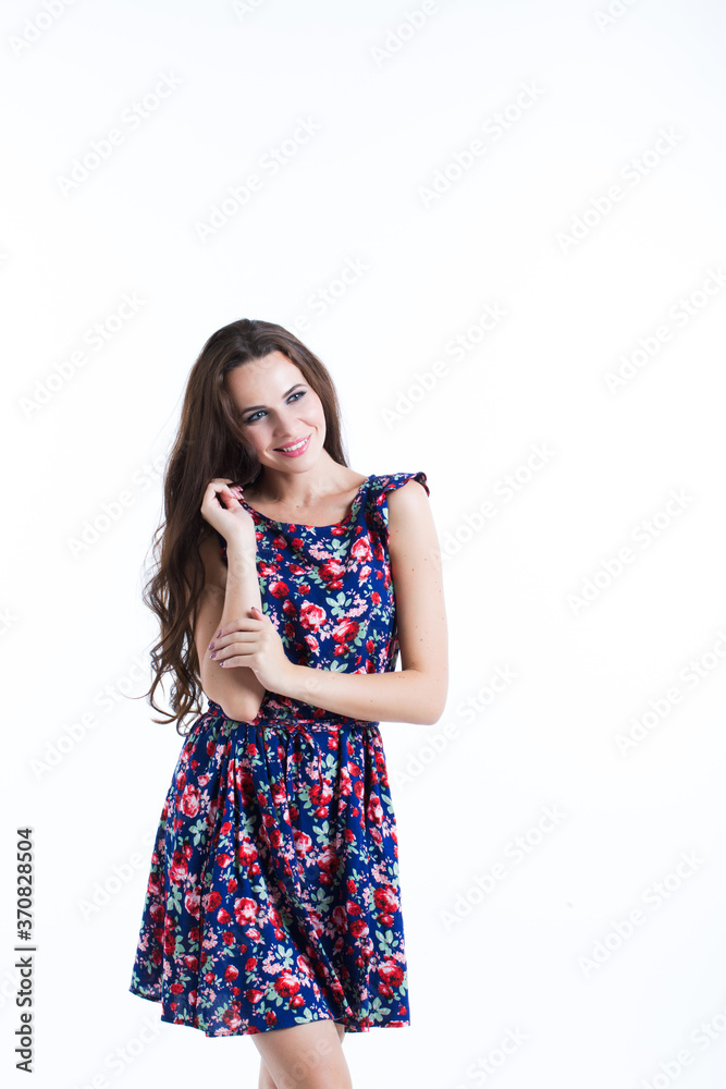Slim curly female model in romantic attire pretty smiling isolated on white. Slim curly female model in romantic attire pretty smiling isolated on white.