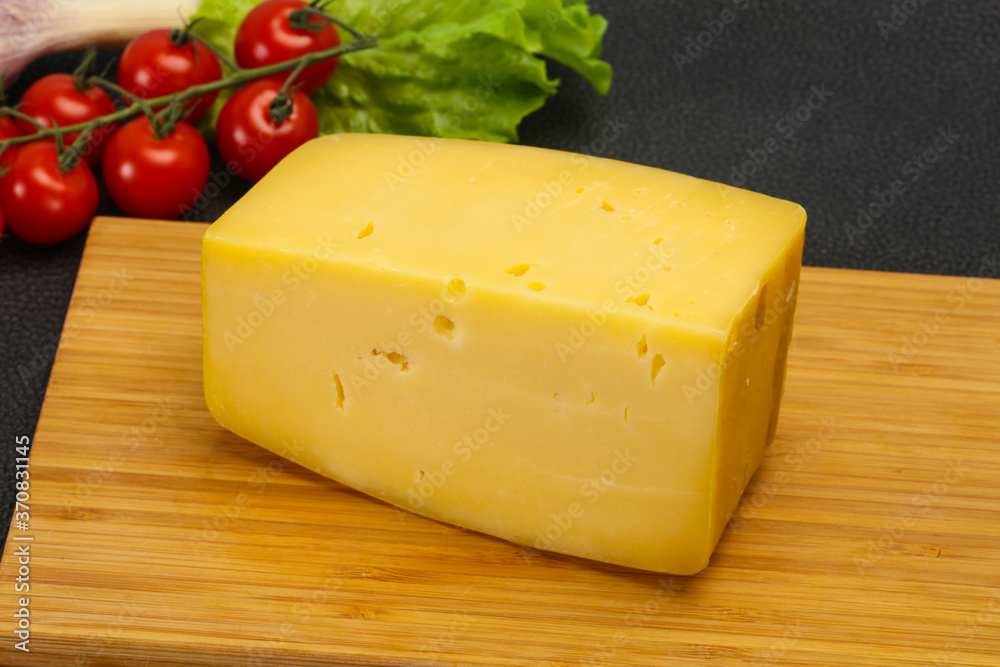 Hard yellow tasty cheese brick Hard yellow tasty cheese brick