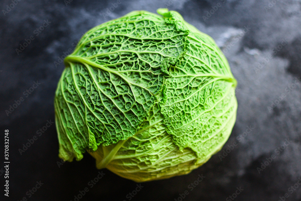 Obraz premium savoy cabbage raw fresh green vegetable harvest organic natural product ingredient eating healthy keto or paleo diet 