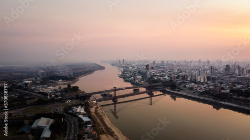sunset over river and bridge argentina © Julian