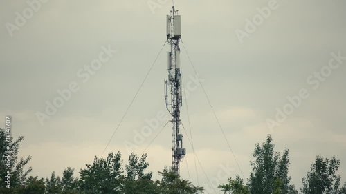 Telecommunication tower. Telecom tower antennas and satellite transmits the signals of cellular 5g 4g mobile signals to the consumers and smartphones. 4k. 24 fps