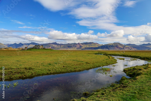 landscape with stream and mountains