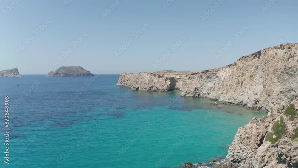 Wide Aerial Drone View over Greek Island Milos in Summer with Turquoise Blue Aegean Sea Wide Aerial Drone View over Greek Island Milos in Summer with Turquoise Blue Aegean Sea