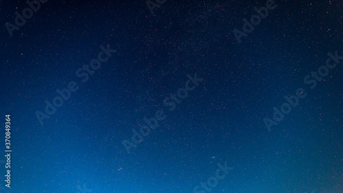 The starry night sky. A lot of stars, the Milky Way and the Andromeda galaxy. 