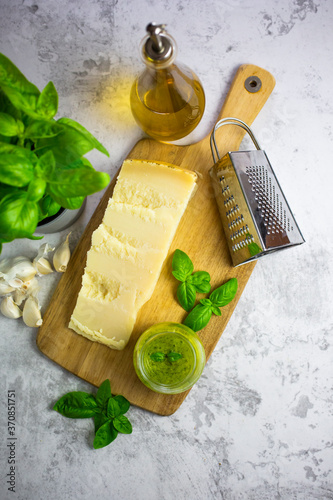 Pesto with garlic and basil and grana cheese and olive oil photo