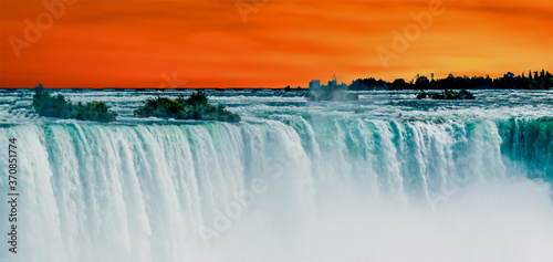 Horseshoe Falls of Niagara Falls, Ontario, Canada with Sunrise background