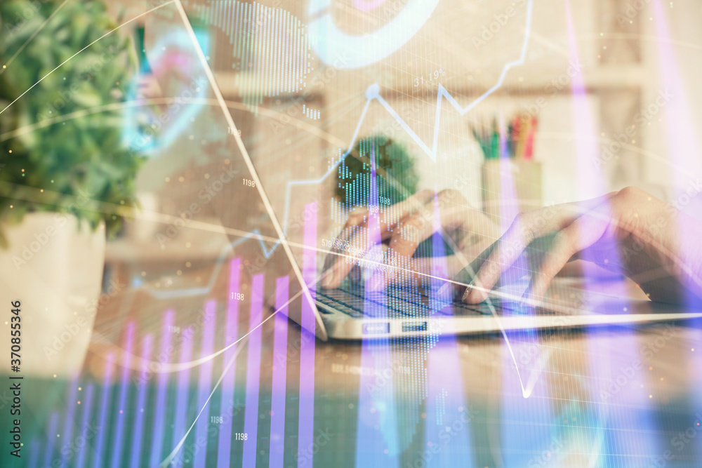 Double exposure of woman hands typing on computer and forex chart hologram drawing. Stock market invest concept.